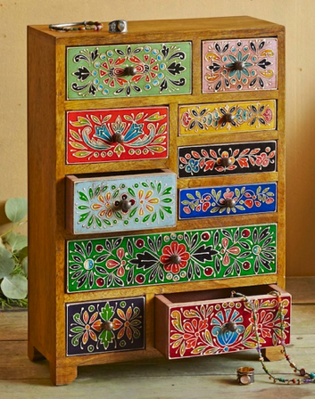 Jan 14 - There's just something wonderful about this little chest of drawers. The colors, the patterns, the size and randomness of the drawers... cute!